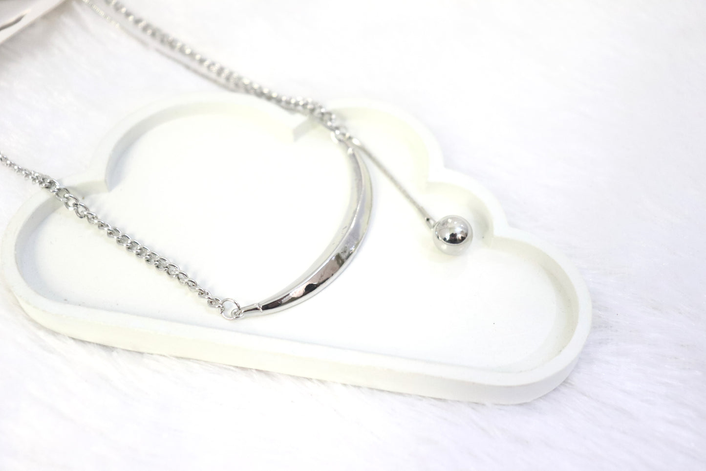 Sleek Silver Crescent Pendant Necklace